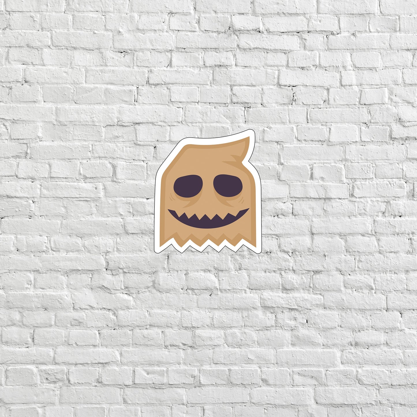 a sticker of a brown monster with eyes