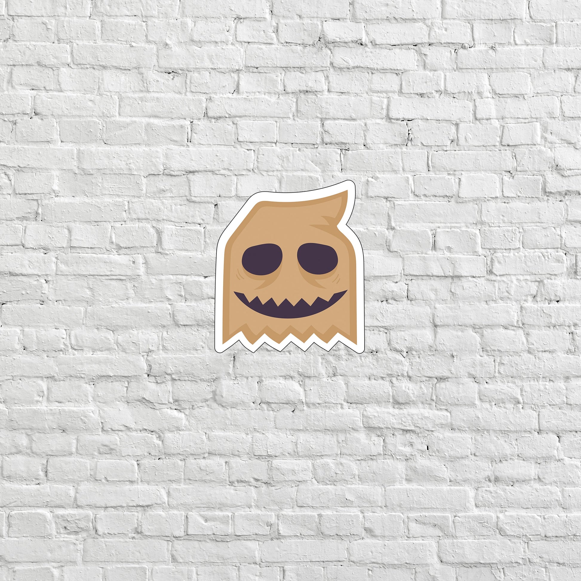 a sticker of a brown monster with eyes