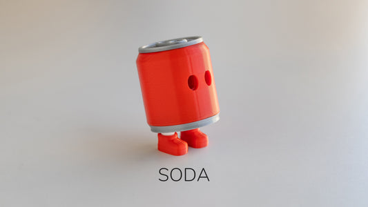 a red soda can with the word soda on it