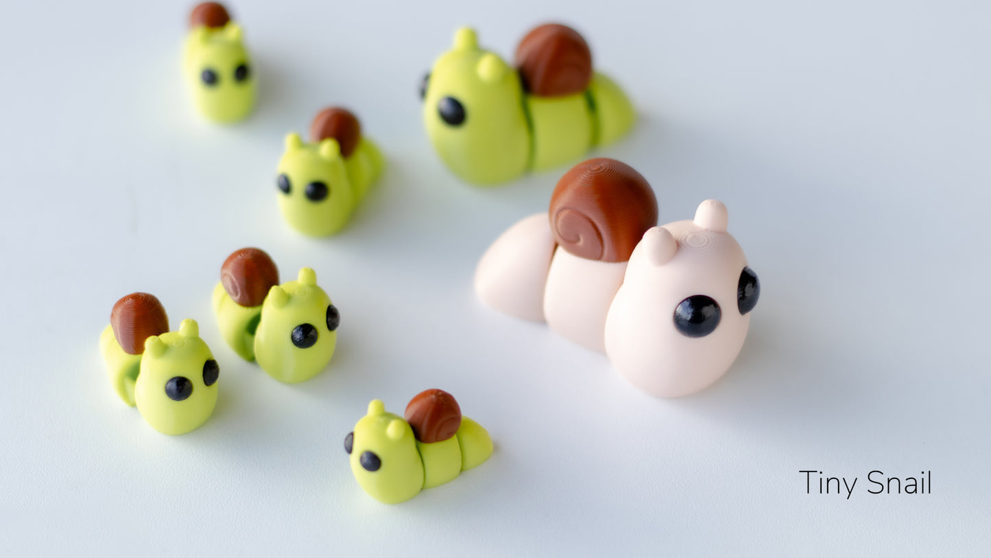 a group of small toy animals sitting on top of a table