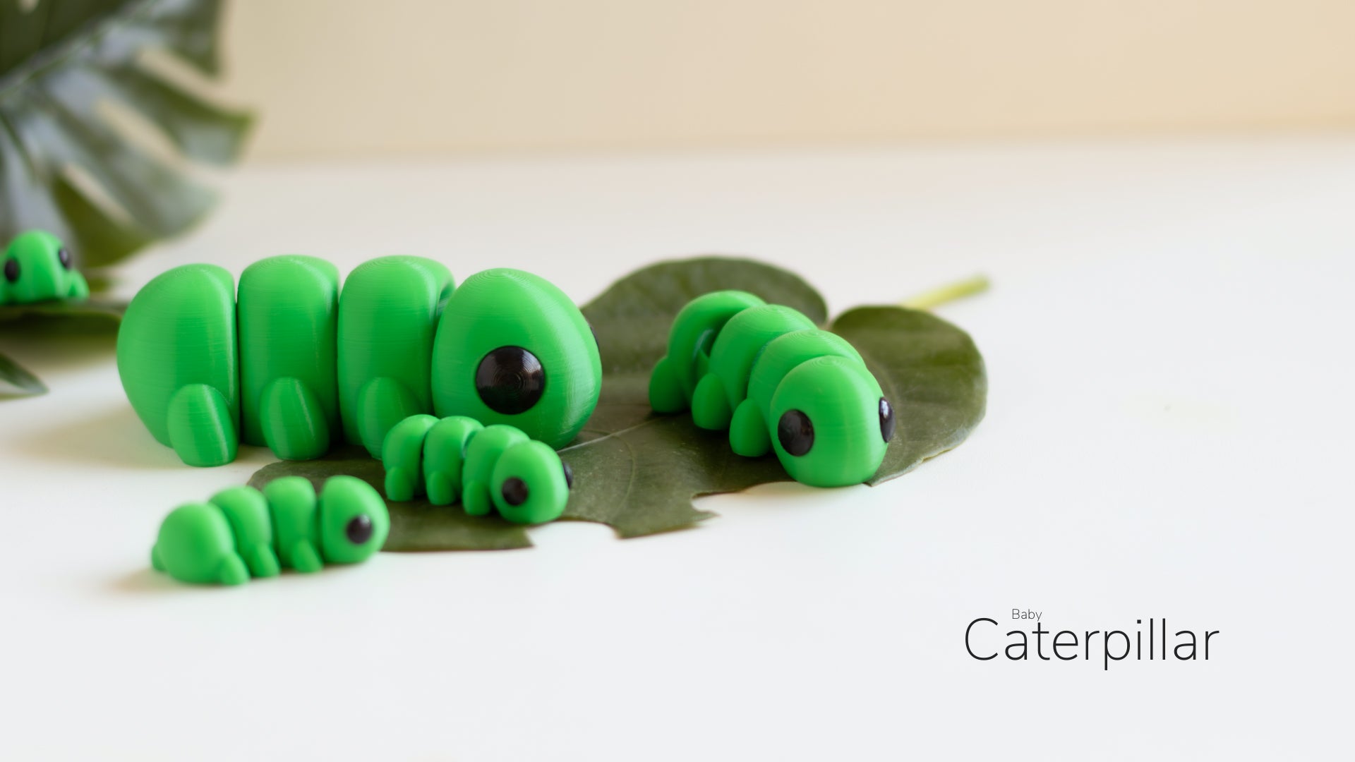 a close up of a cake shaped like a caterpillar