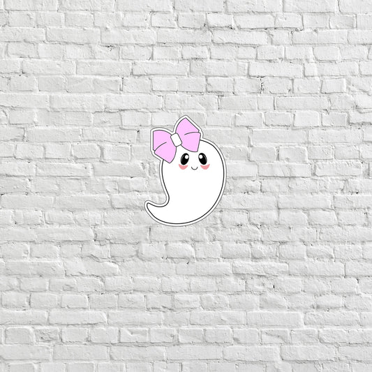 a white brick wall with a pink bow on it