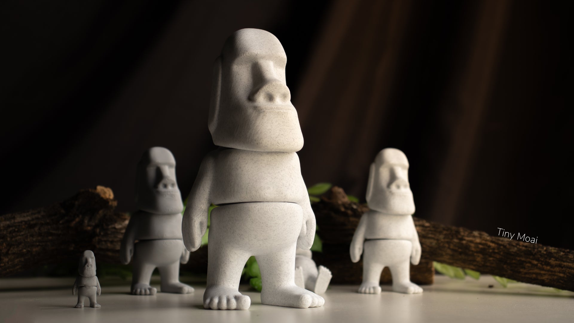 a group of small white figurines sitting on top of a table