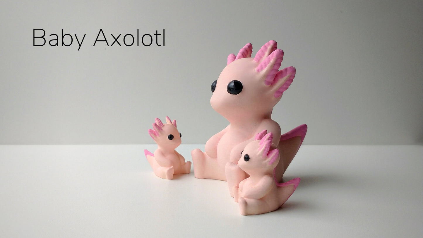 a baby axolot is sitting next to its mother