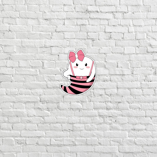 a white brick wall with a cartoon character on it