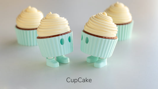 a couple of cupcakes that are sitting on a table