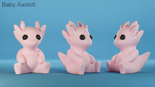 three little pink figurines sitting next to each other