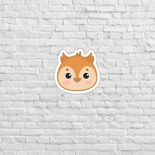 a sticker of a squirrel on a white brick wall