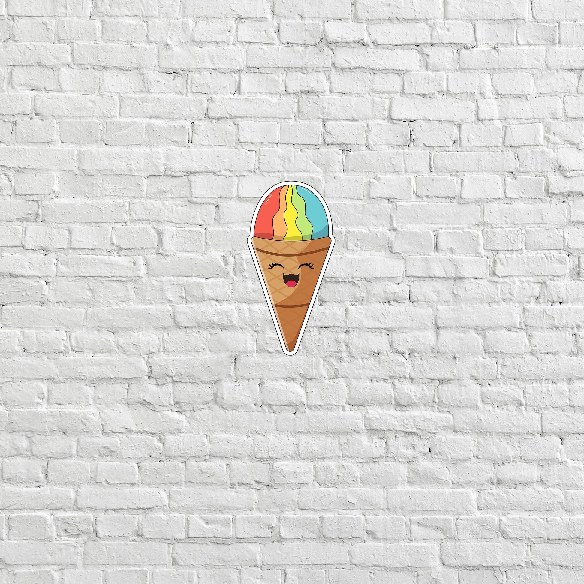 a sticker of a ice cream cone on a white brick wall