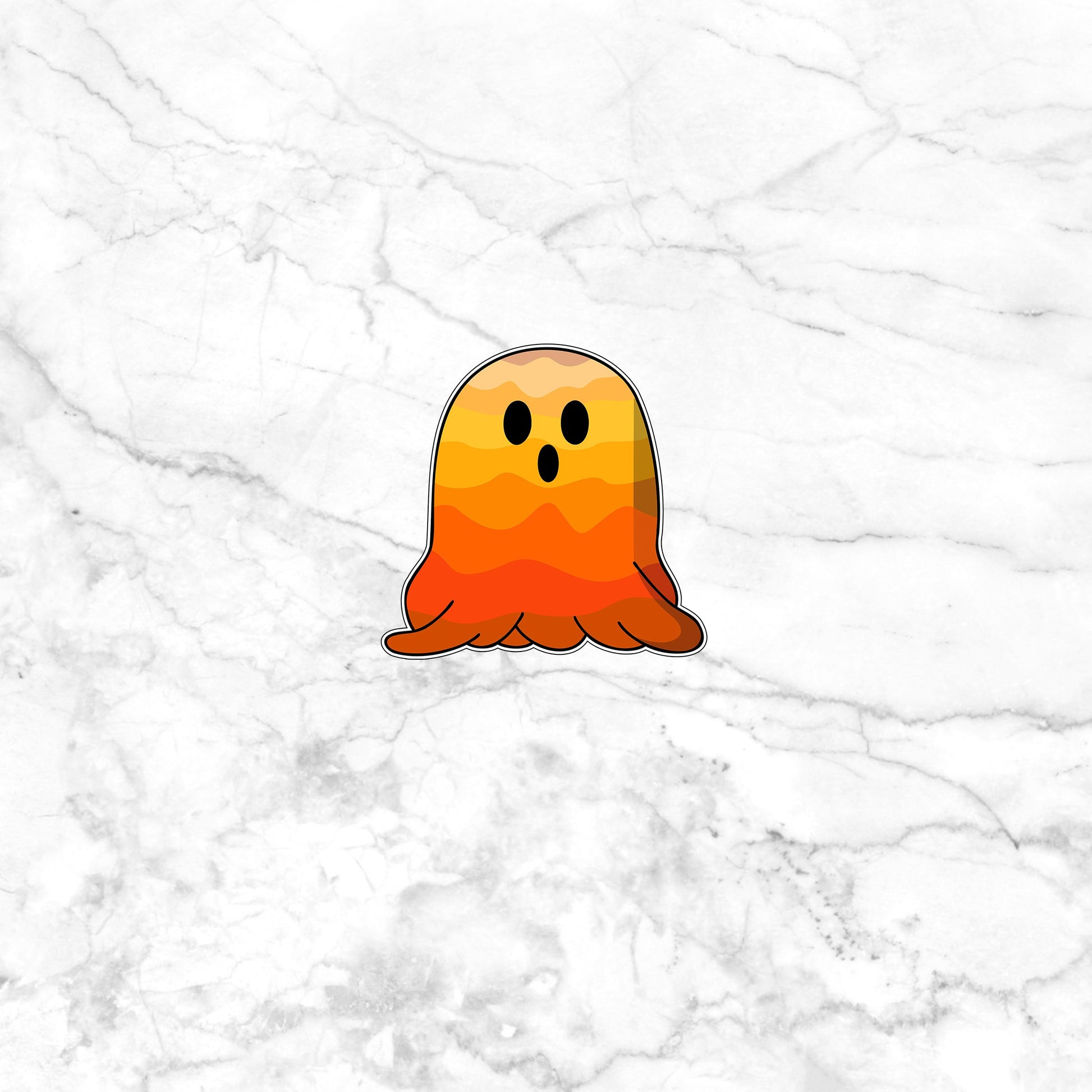 a sticker of a ghost on a marble surface