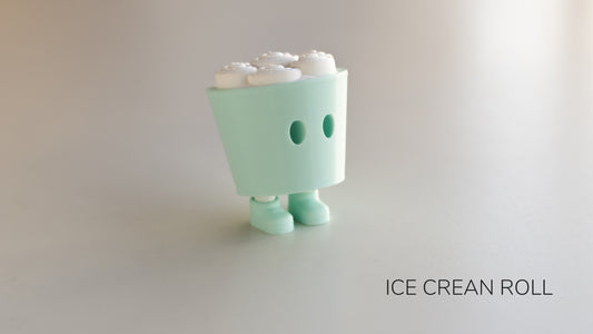 an ice cream roll toy standing on a white surface