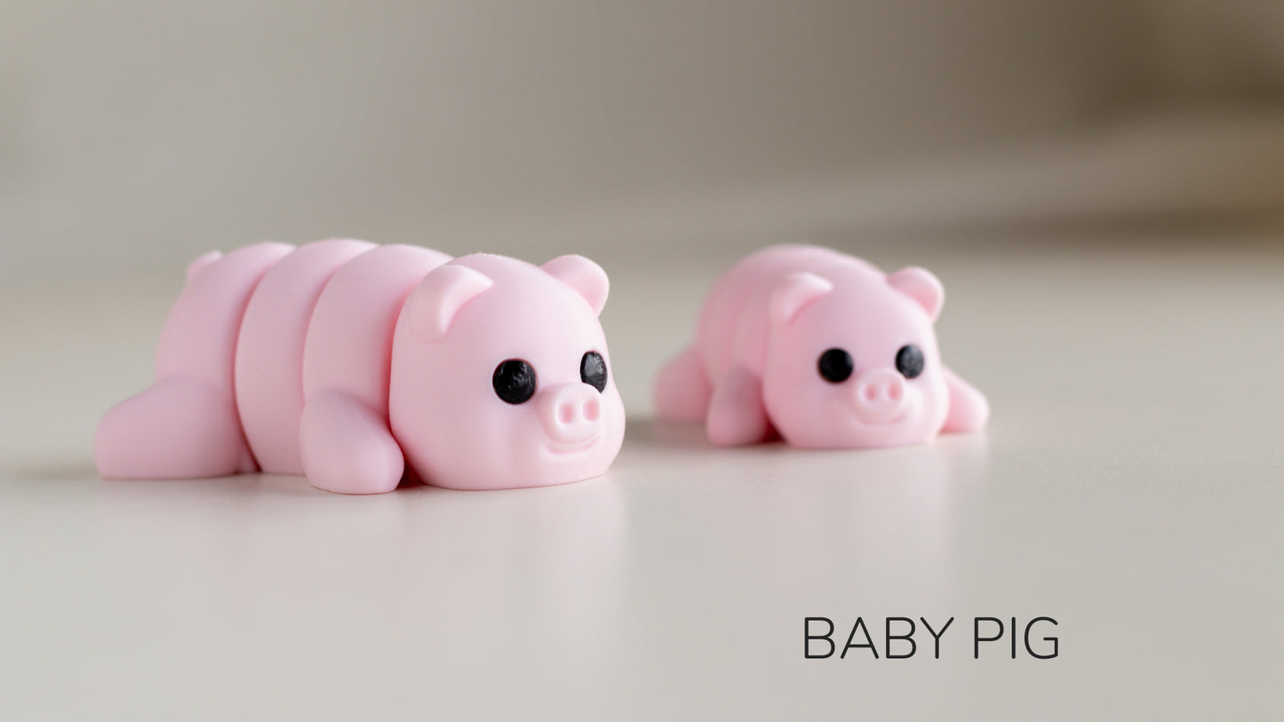 a couple of pink pigs sitting next to each other