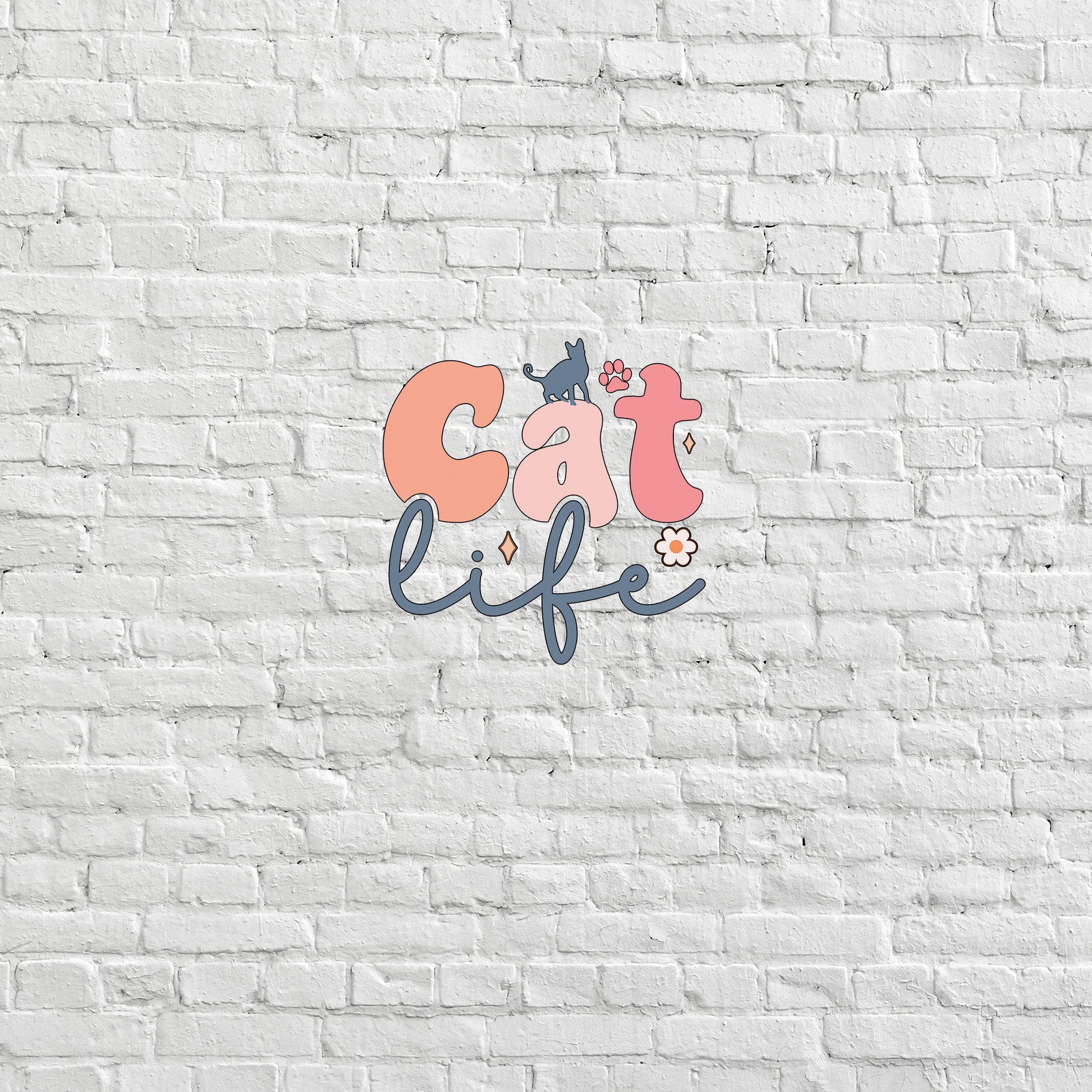 a white brick wall with the words cat life painted on it