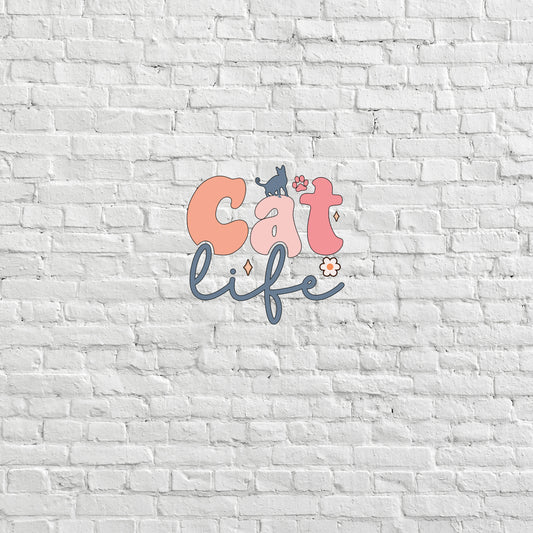 a white brick wall with the words cat life painted on it