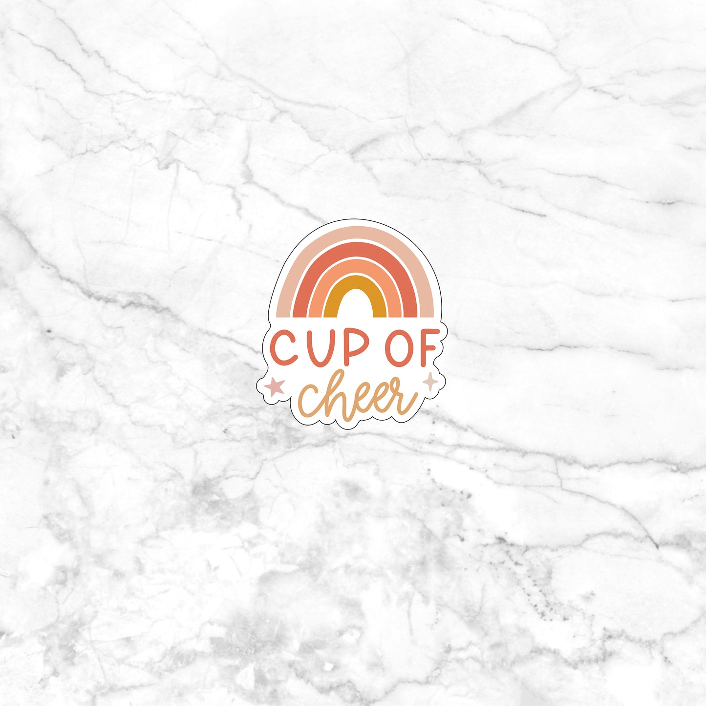 a cup of cheer sticker on a marble surface