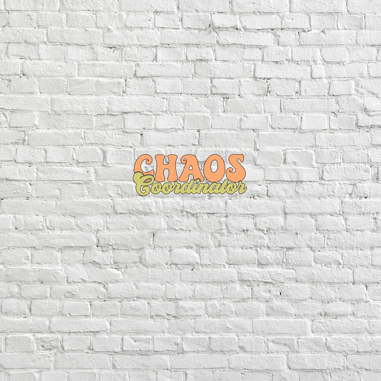 a white brick wall with the word chaos on it