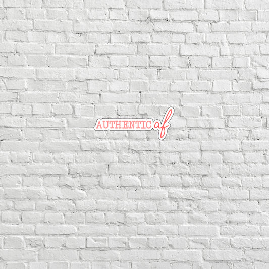 a white brick wall with the word authentic on it