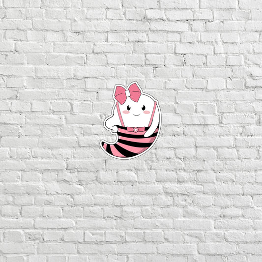 a white brick wall with a cartoon character on it