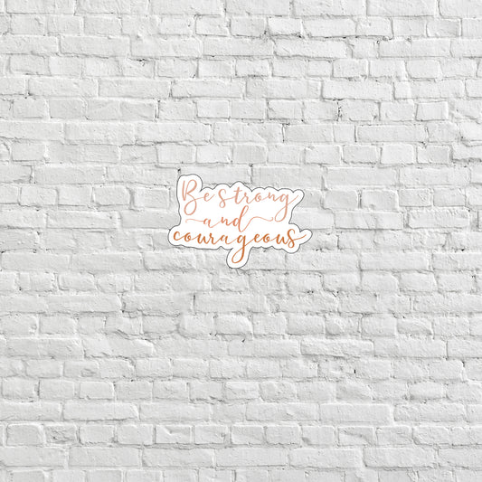 a white brick wall with a pink lettering on it