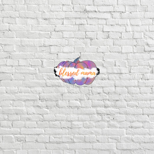 a white brick wall with a painted pumpkin on it