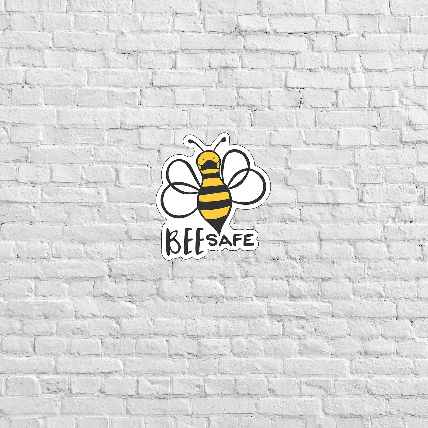 a white brick wall with a bee logo on it