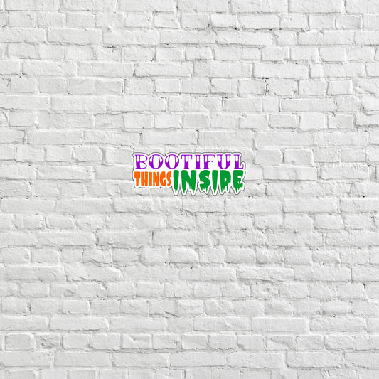 a white brick wall with a colorful word on it