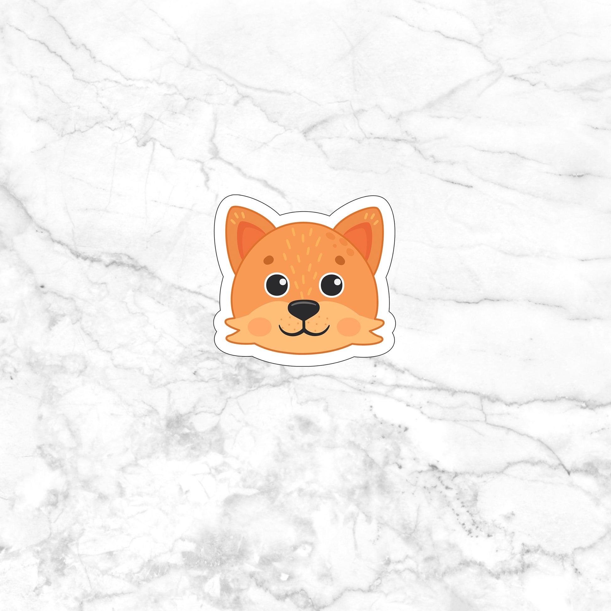 a sticker of a dog's face on a marble surface