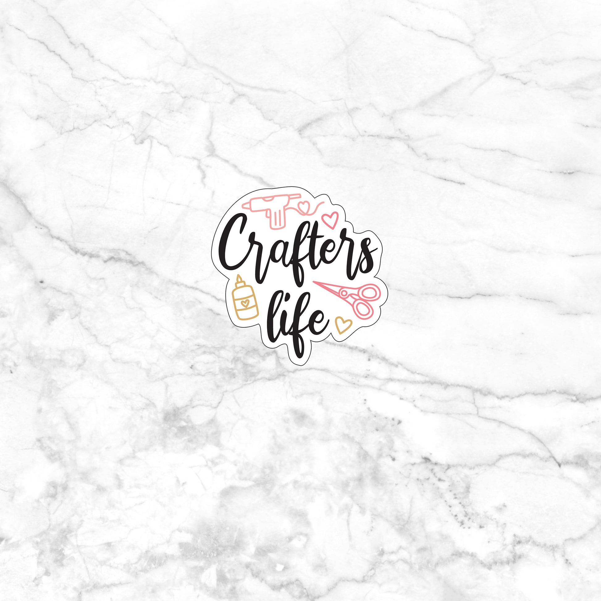 the crafter's life sticker on a marble surface