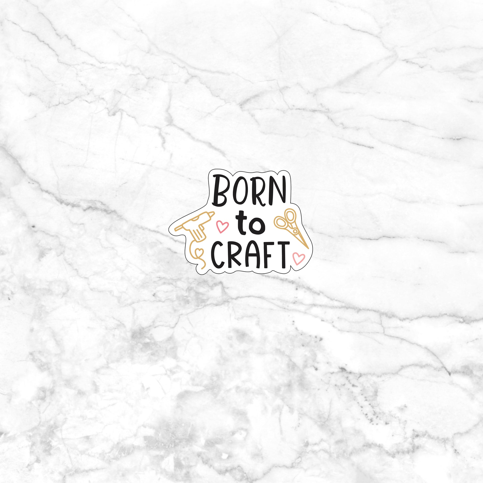 a sticker that says born to craft on a marble background