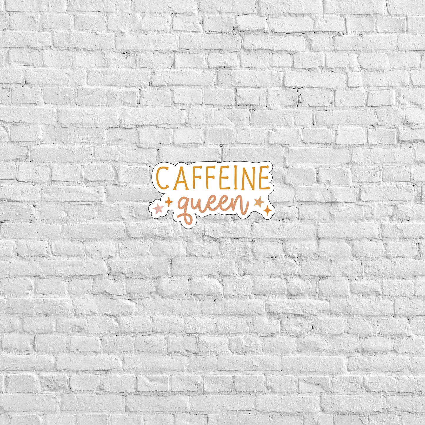 a white brick wall with the words caffeine queen on it