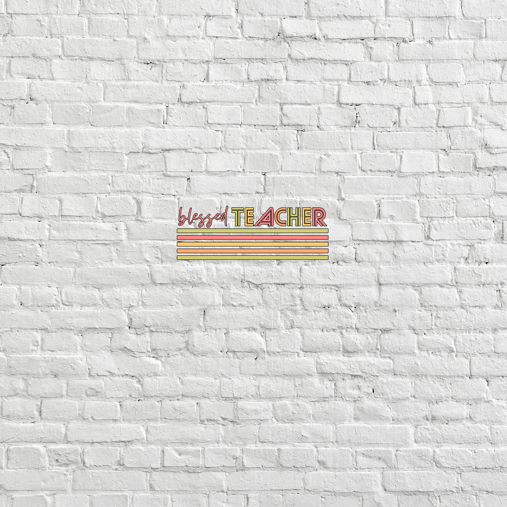 a white brick wall with the word teacher on it
