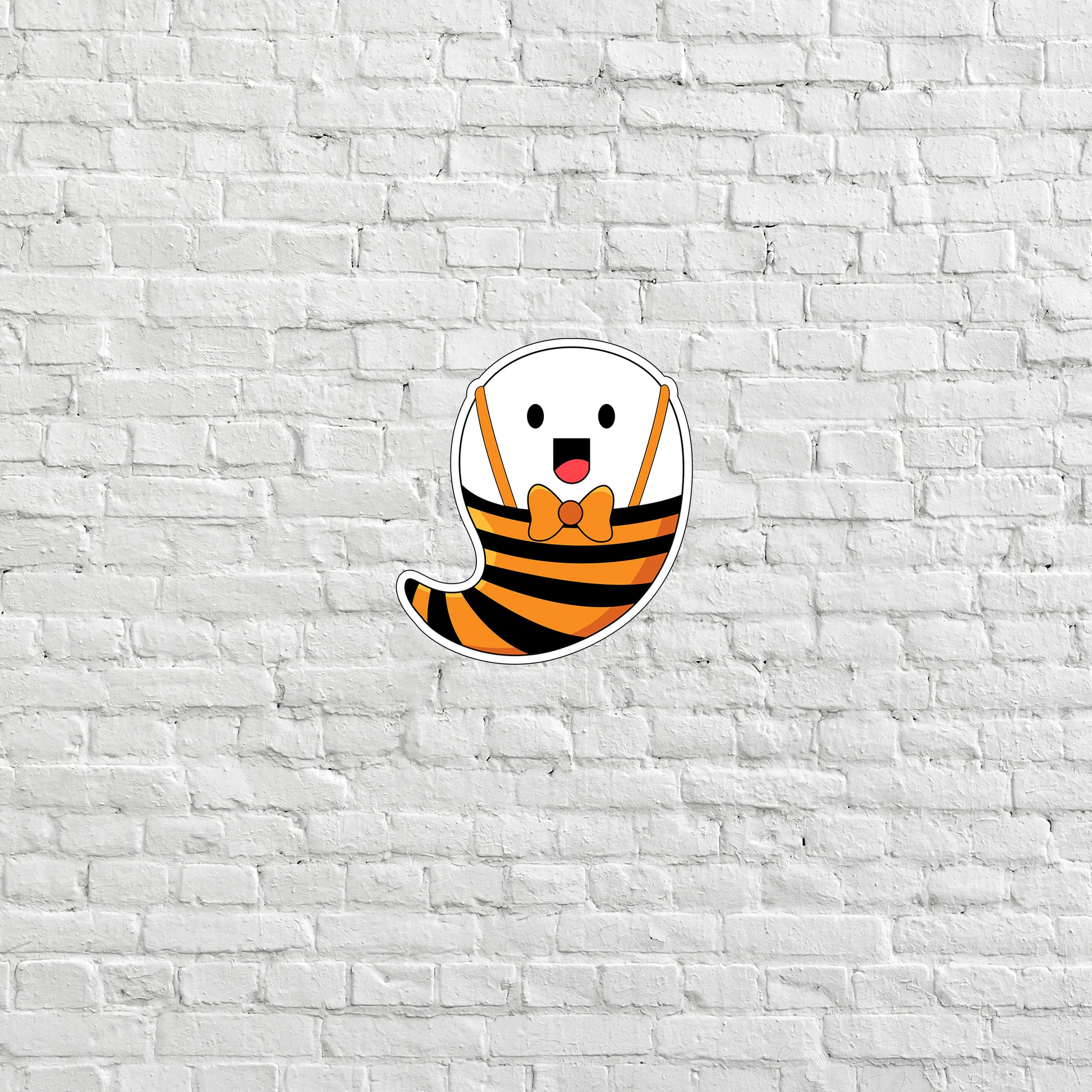 a white brick wall with a cartoon character on it