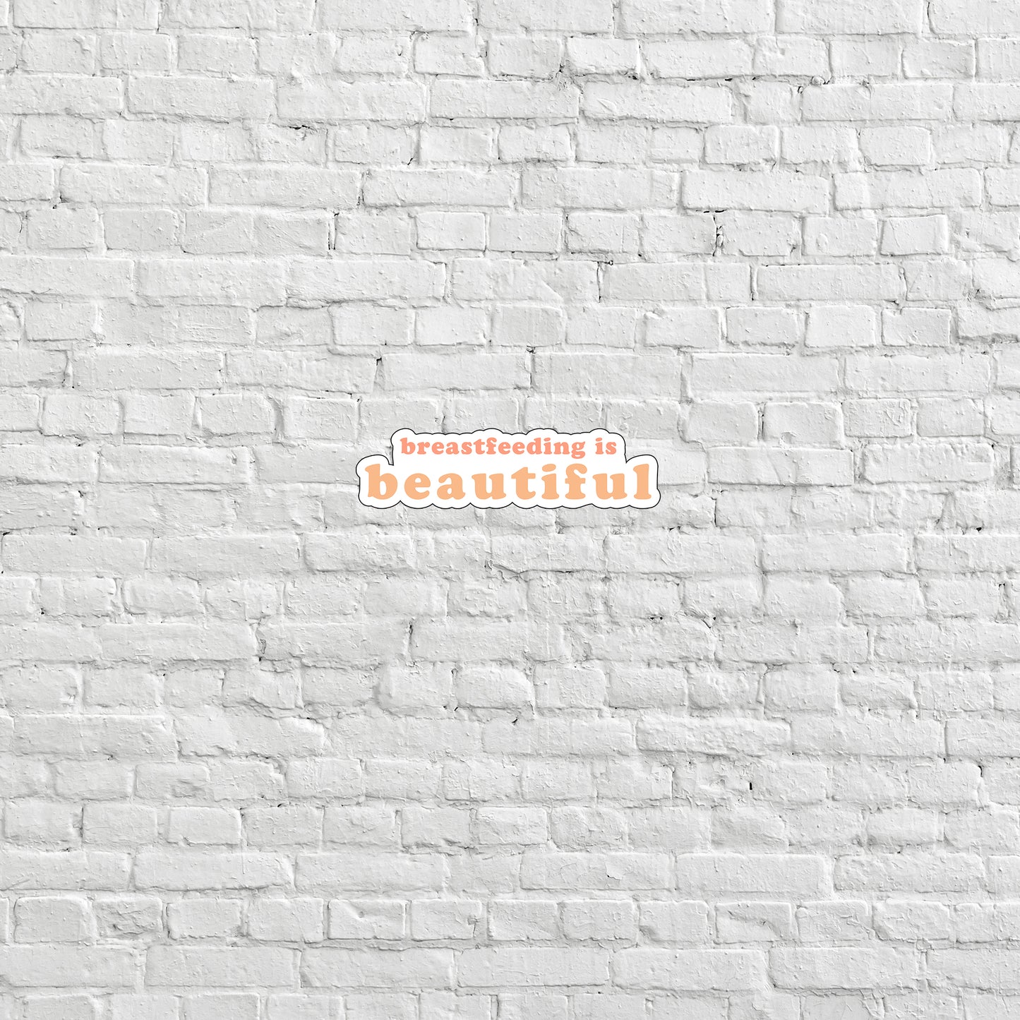 a white brick wall with the words beautiful is beautiful on it