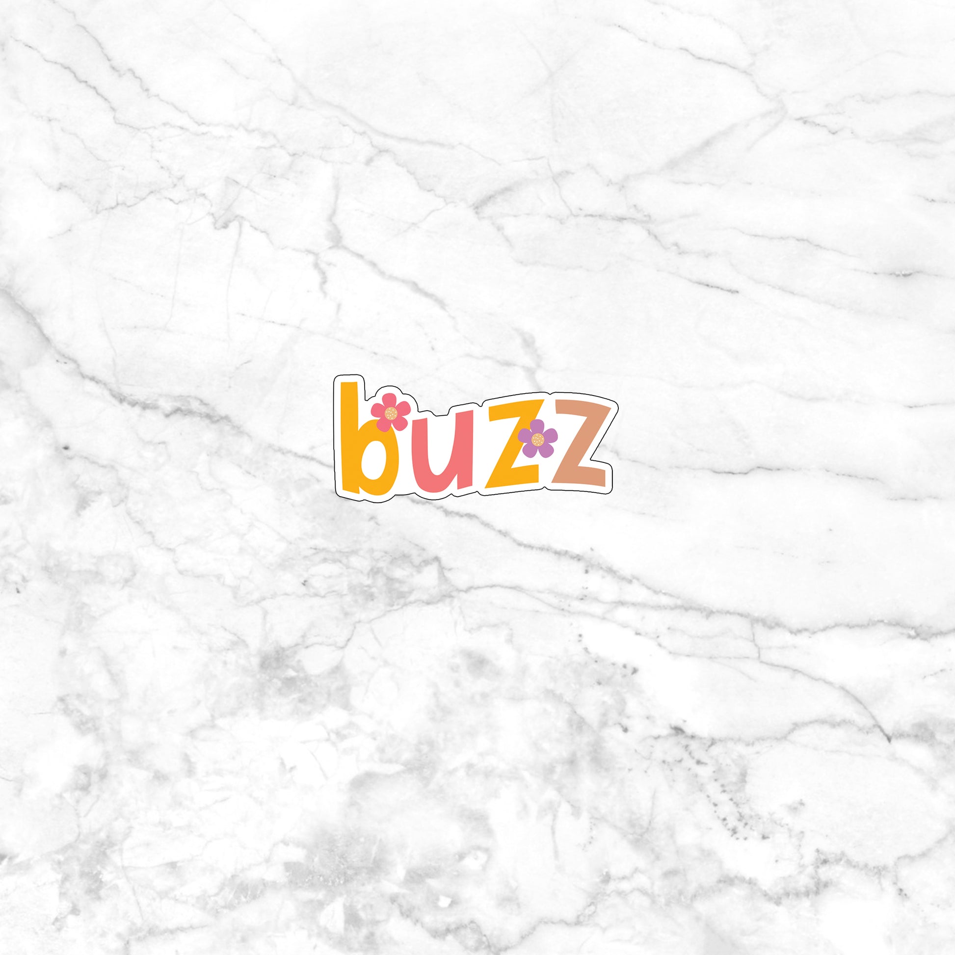 a marble surface with the word buzz on it